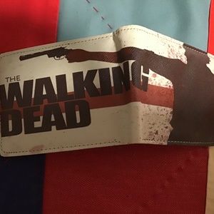 Free add on with any bundle over $25. The Walking Dead Men’s Bi-fold Wallet
